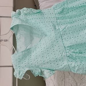 Lined mint green eyelet material dress. Also one in black